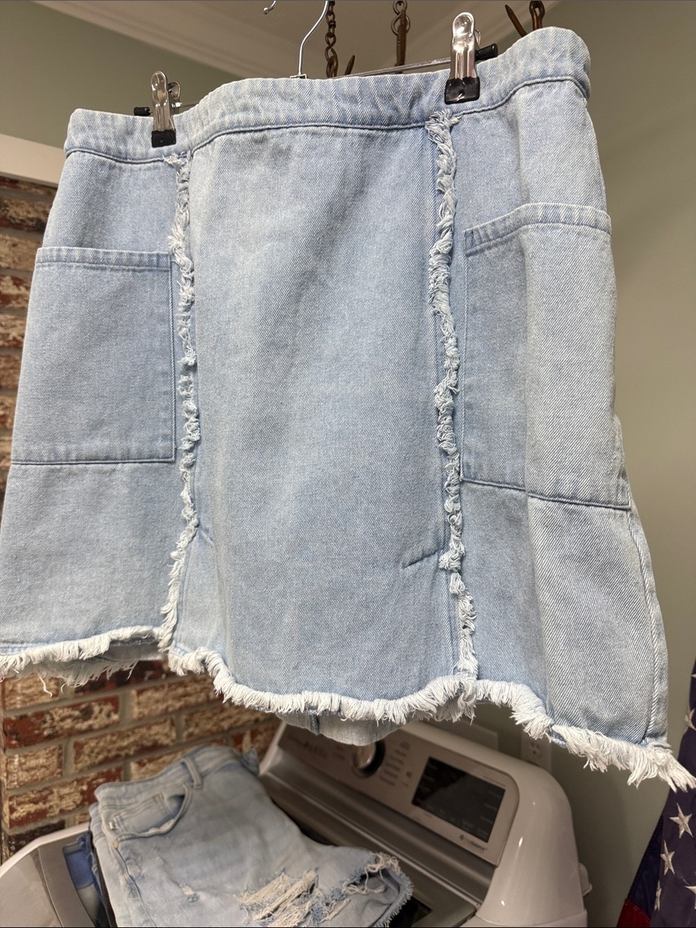 Umgee Light Wash Denim Frayed-Hem Mini Skirt